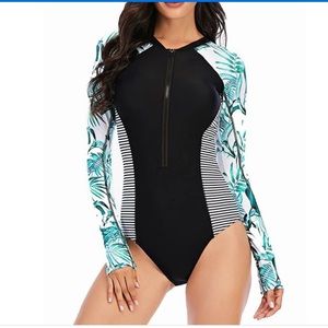 NWT!!! Zip front one piece rash guard for days of play in style with no sunburn.